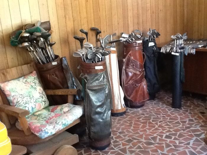 Ping golf clubs plus huge assortment of other clubs and bags 