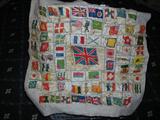 Cigarette silks stitched to make a pillow square.