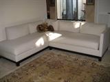 7'10" x 10' carpet; 2 piece corner sofa 84" x 98" overall.  66" Love Seat not pictured.  