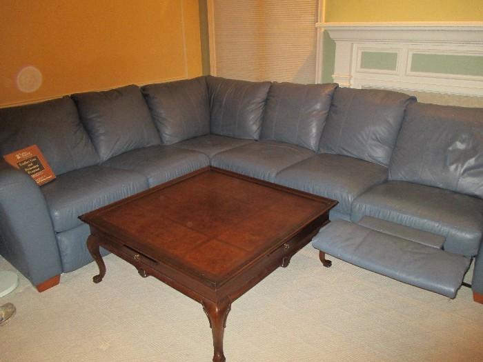 5 piece sectional w/recliner on each end.  Square cocktail/coffee table with pull out trays on all sides.