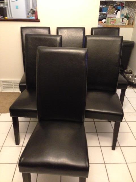 Six Black Leather Chairs