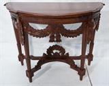 Lot 27  -  Contemporary carved wood console table. Floral decoration.-- Dimensions:  H: 31 1/2 inches: W: 40 inches: D: 18 1/4 inches --- 