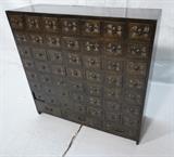 Lot 63  -  Antique Chinese medicine cabinet. 52 Drawers. Gingo and elm wood. Manufactured in the Yi Dynasty period. Dating around 150 years old. ringed metal pulls. Each drawer has a different Chinese symbol.-- Dimensions:  H: 33 1/2 inches: W: 34 3/4 inches: D: 11 3/4 inches --- 