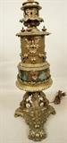 Lot 76  -  Fancy Brass/Bronze Table Lamp.  Intricate Cast Decoration.-- Dimensions:  H: 39 inches: W: 9 inches --- 