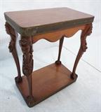 Lot 77  -  Small Carved Wood Table With Figural Legs.  Metal Trim.-- Dimensions:  H: 23 inches: W: 19 inches: D: 11 inches --- 
