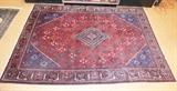 Lot 94  -  8'3" x 11'9"Roomsize Oriental Carpet.  Geometric with red background.-- Dimensions:  H: 11'9 inches: W: 8'3" inches --- 