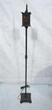Lot 128  -  Gothic Style Floor Lamp. Mica Shade.  Black Iron.-- Dimensions:  H: 62 inches: W: 9 inches --- 