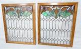 Lot 131  -  Pair of Vintage Stain Glass Windows.  Stained glass tightened and reframed.  Colorful top.-- Dimensions:  H: 46 inches: W: 38 inches --- 