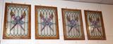 Lot 135  -  Set 4 Vintage Stained Glass Windows.  Torch design.  Stain Glass tightened and reframed.-- Dimensions:  H: 30.5 inches: W: 20.75 inches --- 