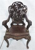 Lot 141  -  Chinese Heavily Carved Arm Chair.  Floral Decoration.-- Dimensions:  H: 44 inches: W: 27 inches: D: 21 inches --- 