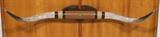 Lot 154  -  Steer Horns Wall Mount with Leather Rapping.-- Dimensions:  H: 8 inches: W: 63 inches: D: 15.5 inches --- 