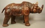 Lot 168  -  Leather Covered Figure of Rhinoceros.  -- Dimensions:  H: 16.5 inches: W: 9 inches: D: 29 inches --- 