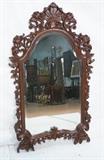 Lot 170  -  Reproduction Carved Wood Wall Mirror.  Beveled Edge.  Openwork carving.-- Dimensions:  H: 52 inches: W: 31.5 inches --- 
