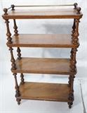 Lot 173  -  Victorian What Not Shelf.  4 Tier with brass rod gallery.  Turned supports.-- Dimensions:  H: 40.5 inches: W: 24.5 inches: D: 10.5 inches --- 