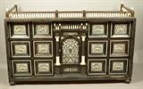 Lot 176  -  Italian Architectural Collectors Cabinet.  Ebonized and inlaid Case.  Bone or ivory baluster gallery.-- Dimensions:  H: 23 inches: W: 34 inches: D: 13 inches --- 
