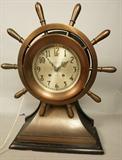 Lot 195  -  Chelsea Ship's Bell Yacht wheel Mantle Clock.  Chelsea Clock Co. Boston U.S.A.  Ships Bell.  Serial # 161245-- Dimensions:  H: 17.25 inches: W: 14.5 inches: D: 5.5 inches --- 