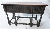 Lot 56  -  Italian Renaissance style console table with twisted column base. heavy carving with figures. Opposing drawers on either end.-- Dimensions:  H: 32 3/4 inches: W: 48 3/4 inches: D: 31 3/4 inches --- 