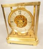 Lot 201  -  Le Coultre Atmos Clock.  Gold finish Case.  15 Jewel. Serial # 38741-- Dimensions:  H: 9.5 inches: W: 8.5 inches: D: 6.5 inches ---  <br><br>US Shipping charge:</b>  $50