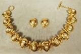 Lot 225  -  Fendi gold tone pearl necklace and earring set. Gold link necklace with acorn finials and cabochon faux pearls. Signed.-- Dimensions:  H: 1 inches: L: 17 inches ---  <br><br>US Shipping charge:</b>  $9