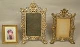 Lot 232  -  Lot of 3 antique metal picture frames. 2 with winged cherubs. -- Dimensions:  H: 11 inches: W: 7 inches: D: 5.5 inches ---  <br><br>US Shipping charge:</b>  $20