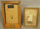 Lot 233  -  Lot 2 antique picture frames. One Secessionist wood frame with metal details. One metal frame. -- Dimensions:  H: 7.5 inches: W: 5.25 inches ---  <br><br>US Shipping charge:</b>  $20