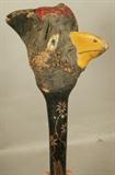 Lot 239  -  Folk art carved bird club/staff. Natural burl form. Carved staff, painted head.-- Dimensions:  H: 26.5 inches: W: 8.5 inches: D: 5 inches ---  <br><br>US Shipping charge:</b>  $20