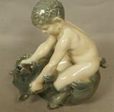 Lot 242  -  Royal Copenhagen Denmark fawn and bear porcelain figure. Marked. No. 648.-- Dimensions:  H: 6 inches: W: 6 inches: D: 3.5 inches ---  <br><br>US Shipping charge:</b>  $20