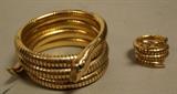 Lot 255  -  2 Piece 14k rolled gold snake jewelry. Coiled bracelet and ring with green stone eyes. Marked 14k RG Germany.-- Dimensions:   ---  <br><br>US Shipping charge:</b>  $9