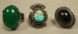 Lot 263  -  3 piece sterling ring lot. 1) Israeli adjustable ring with large oval green stone. 2) Sterling Mexican adjustable ring with blue tiger eye. 3) Sand cast American Indian ring with turquoise and quartz. Not marked. Some chips an losses to turquoise and quartz stone.-- Dimensions:   ---  <br><br>US Shipping charge:</b>  $9