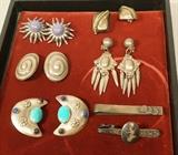 Lot 271  -  7 piece sterling and silver jewelry lot. 5 pair sterling earrings; 2 with stones. Sterling tie clip marked Eve. Siam sterling niello tie clip. -- Dimensions:  : L: 3.25 inches ---  <br><br>US Shipping charge:</b>  $20