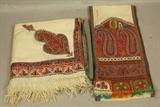Lot 279  -  2 pcs antique wool paisley textiles. 1) Long narrow scarf/table rummer. Cream background with colorful handmade paisley ends. Signed. Small areas with holes. One area of separation from edge trim. 2) Large fringed piece with paisley edge border. Small holes.-- Dimensions:  H: 106 inches: W: 52 inches ---  <br><br>US Shipping charge:</b>  $20