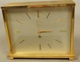 Lot 287  -  Bulova Accutron Desk Clock.  Model 214. Serial # D2051-R.  Has original instruction booklet.-- Dimensions:  H: 4.5 inches: W: 5.5 inches: D: 2 inches ---  <br><br>US Shipping charge:</b>  $20