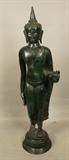 Lot 300  -  Bronze India Sculpture of Standing Figure.  Dark Patina.-- Dimensions:  H: 31 inches: W: 9 inches: D: 7 inches --- 