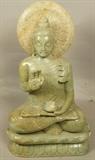 Lot 301  -  Carved Stone Sculpture of Seated Figure.  India.  Heavy solid stone.-- Dimensions:  H: 21.25 inches: W: 13 inches: D: 8 inches --- 