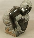 Lot 303  -  K. Munsekiwa Carved Stone Sculpture. African figure with child on back.-- Dimensions:  H: 16.5 inches: W: 11 inches: D: 12 inches --- 