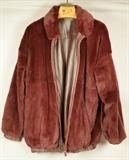Lot 307  -  Reversible Fur Leather Jacket. Leather elastic waist and cuffs. One side fur. one side leather. No label.-- Dimensions:   ---  <br><br>US Shipping charge:</b>  $20