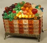 Lot 331  -  Antique Czech Glass Fruit Basket Lamp. Frosted & clear glass fruit. Metal basket with faceted crystal sides. -- Dimensions:  H: 7 inches: W: 7.5 inches: D: 5.5 inches ---  <br><br>US Shipping charge:</b>  $35