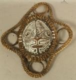 Lot 341  -  African Mask made with Turtle Shell. Woven Textile webbed trim. Painted face on turtle shell with cowry shell details.-- Dimensions:  H: 16 inches: W: 14 inches: D: 3 inches ---  <br><br>US Shipping charge:</b>  $20
