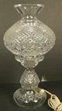 Lot 354  -  WATERFORD Crystal Hurricane Table Lamp. Two piece. Marked-- Dimensions:  H: 14.25 inches: W: 8 inches: D: 8 inches ---  <br><br>US Shipping charge:</b>  $35