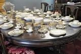 Gold rimmed dinnerware and stemware