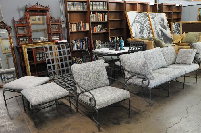 Patio furniture, library of books, photo prints of Watts Towers