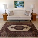 Extremely Clean Nice Carpet, Camel Back Sofa, End tables that do have a matching Coffee Table and Oil Painting