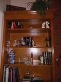 books, angels, vases, figurines, cross, clock