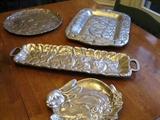 metal trays with rabbits some are Arthur Courts
