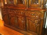 Close up of Midcentury side board.with china cabinet, display/hutch