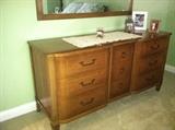 Midcentury high end solid wood 9 drawer dresser and matching mirror.