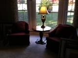 Mid entity, modern octogan pedistal occasional table and club chairs.