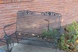 Vintage Meadowcraft wrought iron loveseat.