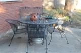 Classic Meadowcraft wrought iron patio table with 4 chairs.  
