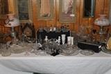 Many nice crystal and glass pieces as well as antique and vintage lamps